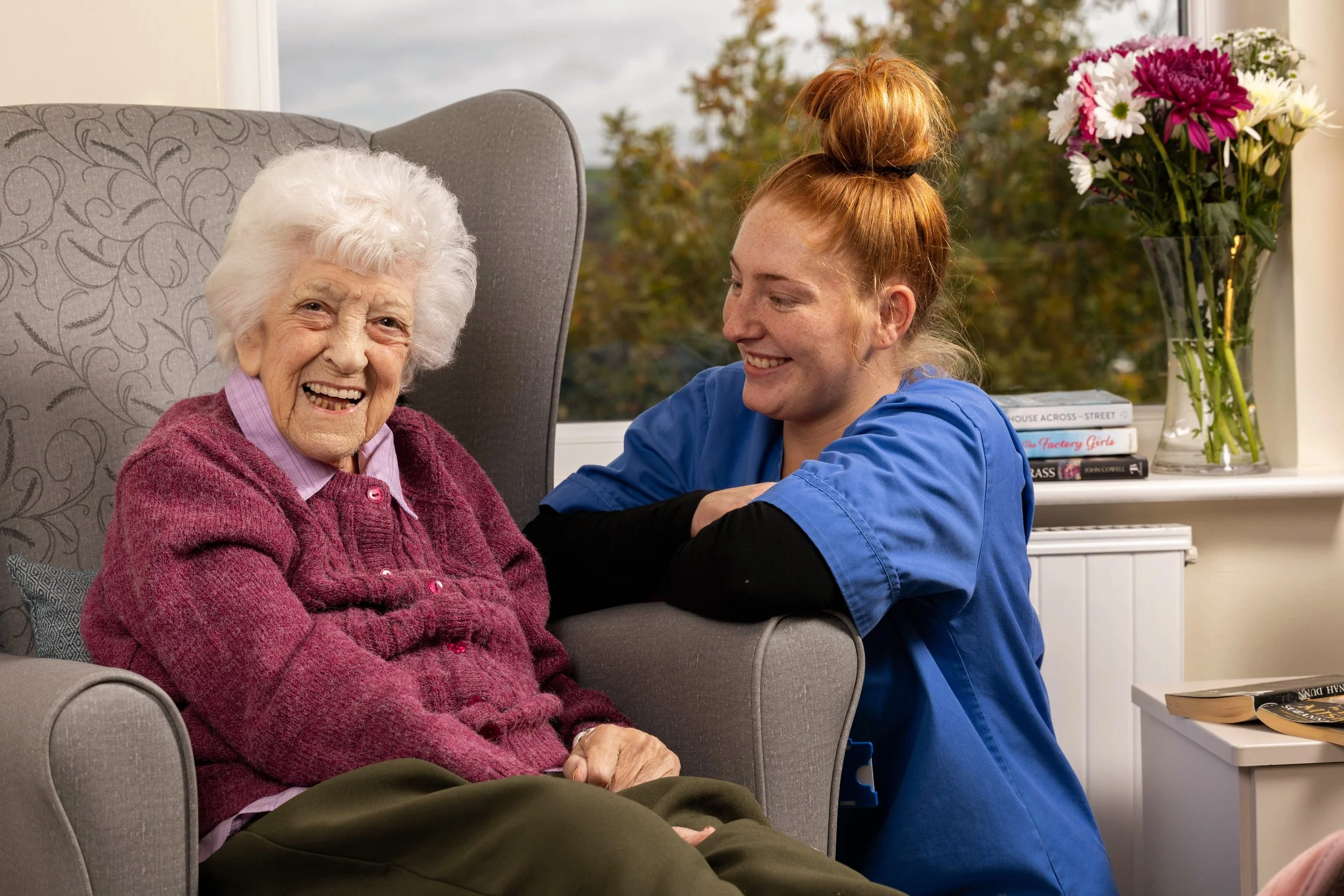 Carer and resident at an Each Other Care home